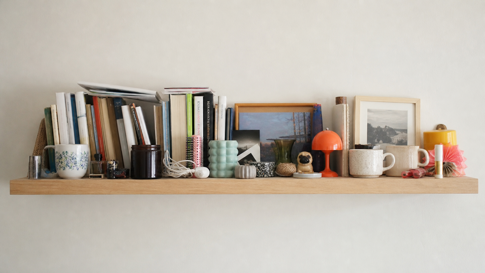 The shelf, crowded with objects